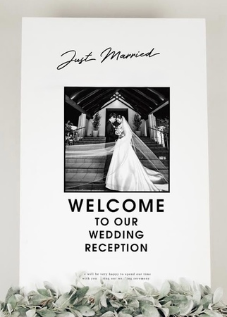 ティファニーで夕食をのお二人の物語を…-2人の映画のポスターのようなウェルカムボード